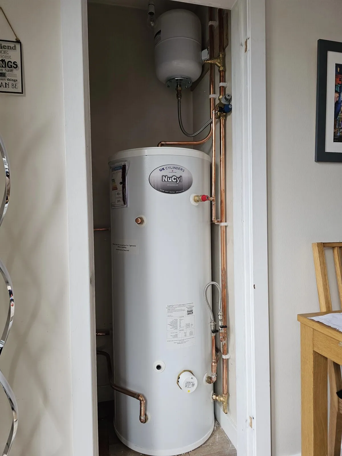 Unvented hot water cylinder installed by Belmont with new copper pipework and expansion vessel